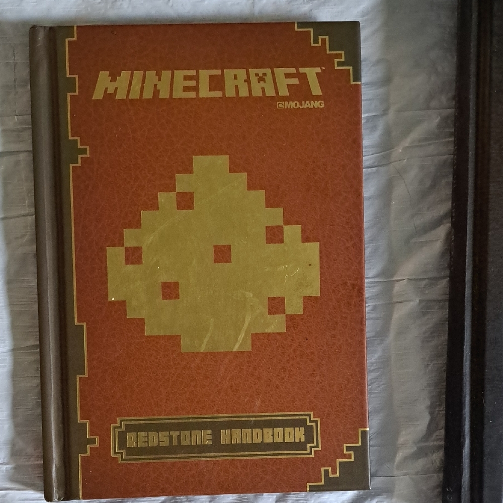 Minecraft Redstone Handbook by - Brown and Gold And Skyrim Volume III The Arcane